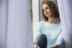 A woman ponders her options for bulimia treatment centers